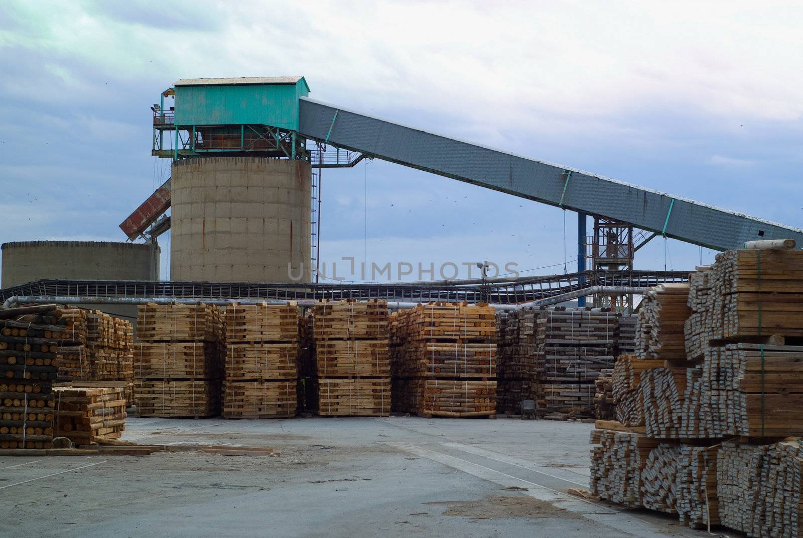Timber industrial wood factory industry image with plant tower in background