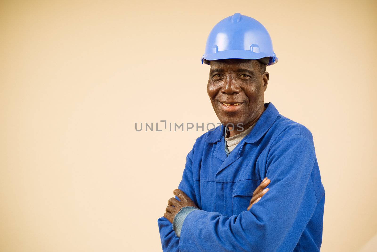 Close up of happy african construction worker, plumber, electrician, handyman