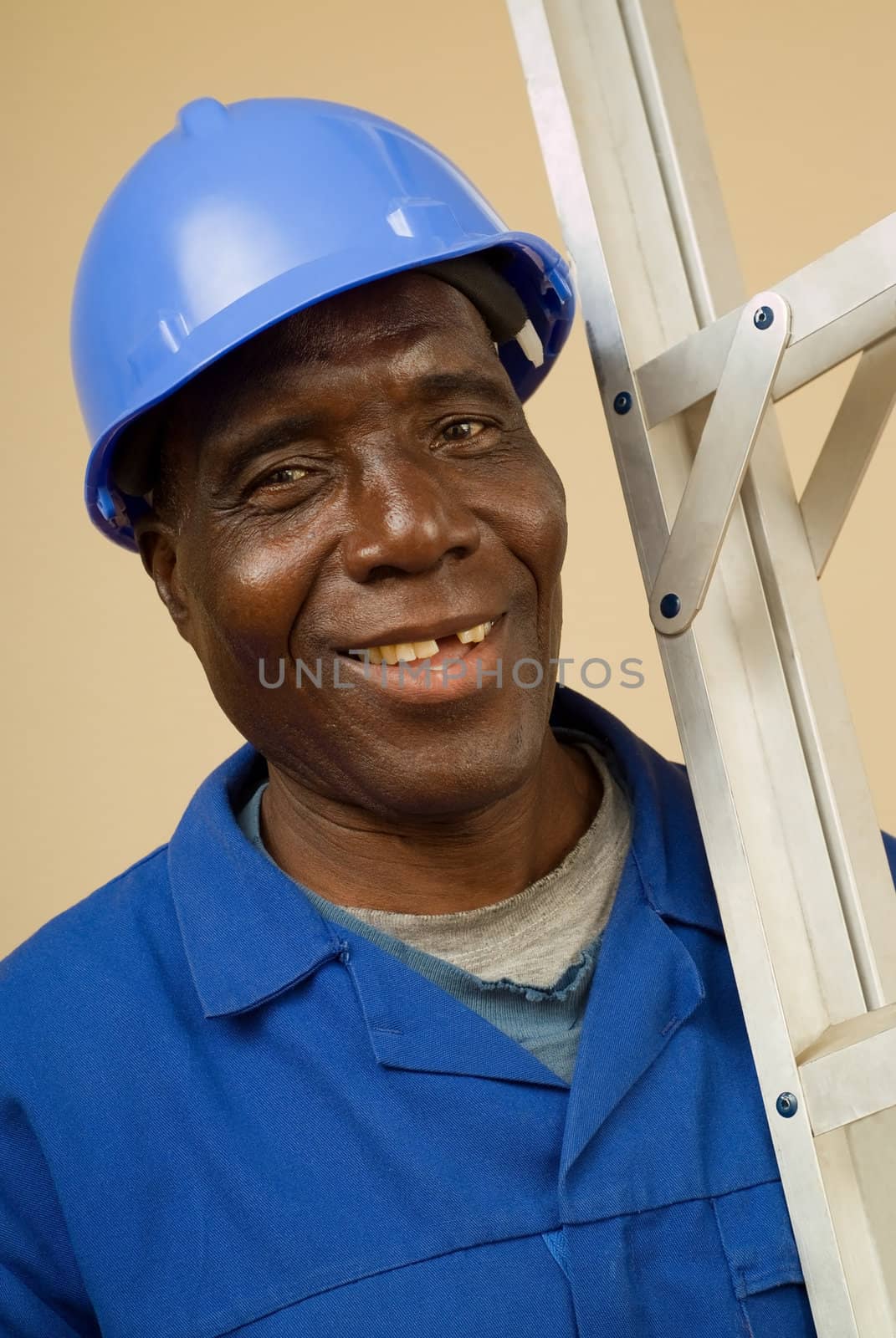 African American Construction Worker, Handyman, Carpenter, Carrying Ladder Over Shoulder