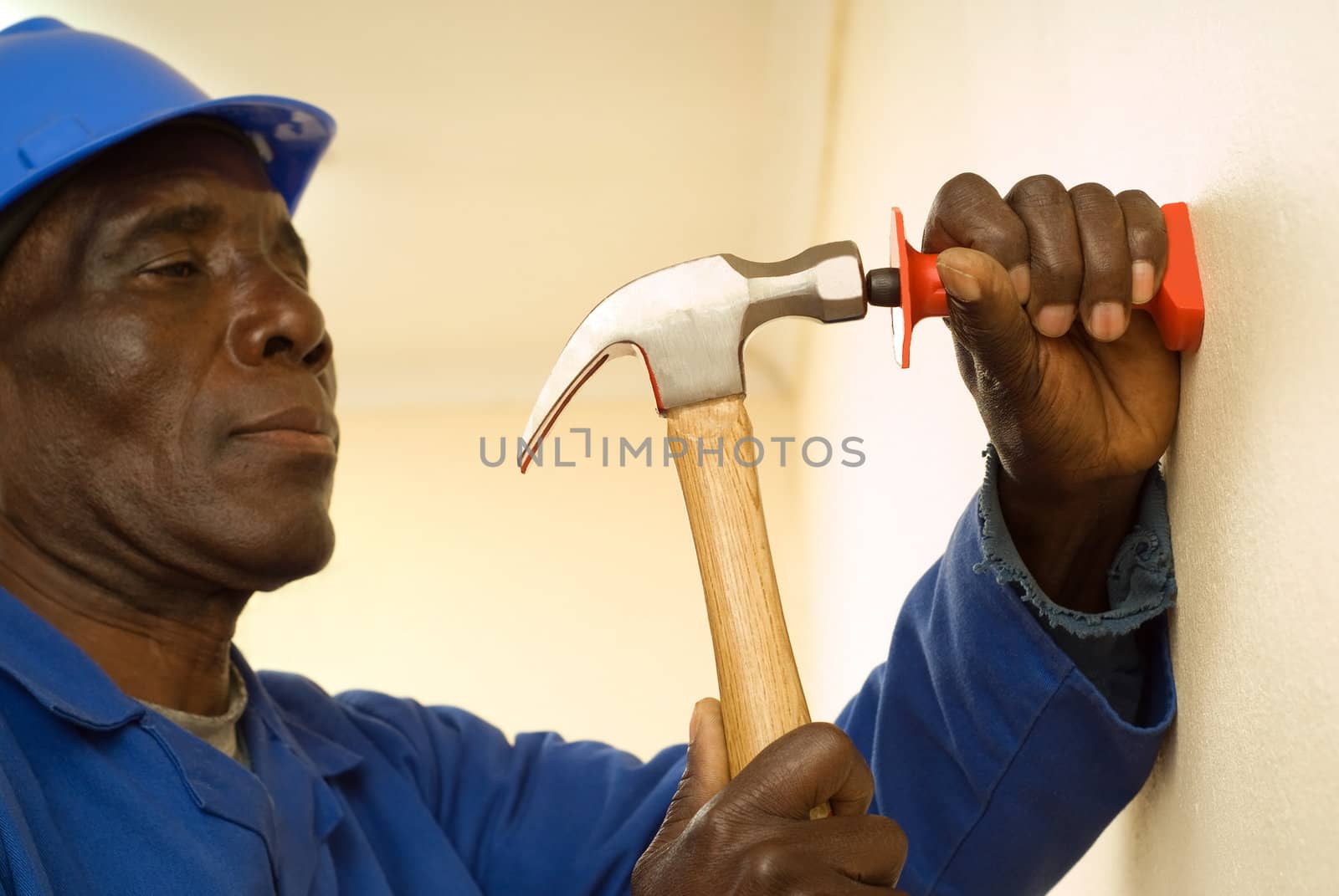 African American Construction Worker, Handyman, Holding Hammer, In Motion