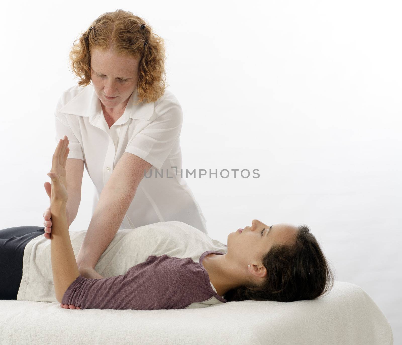 Kinesiologist or physiotherapist treating Triceps