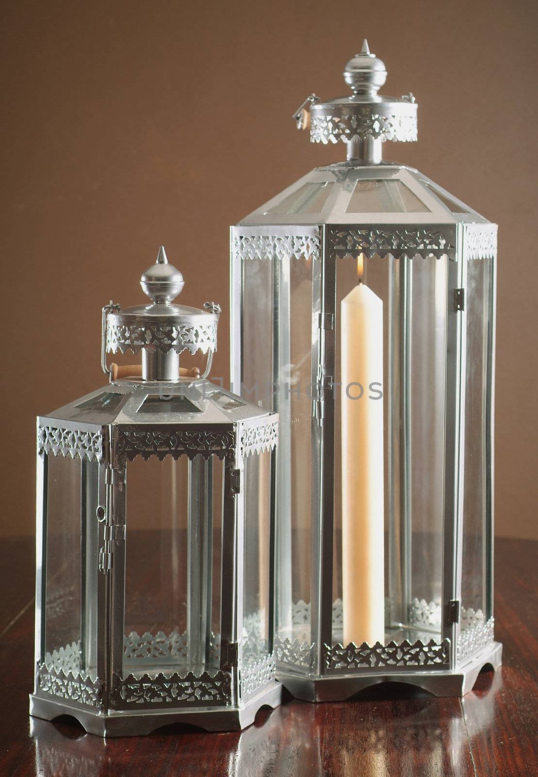 Classic candle lanterns on table