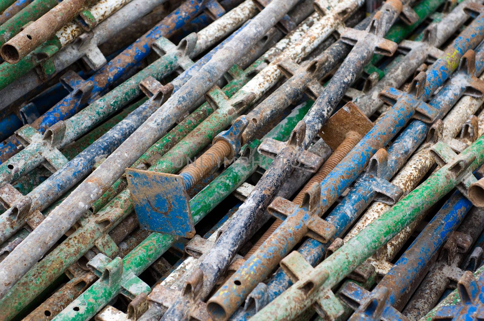 Pile of old constrution scaffold and building support tools