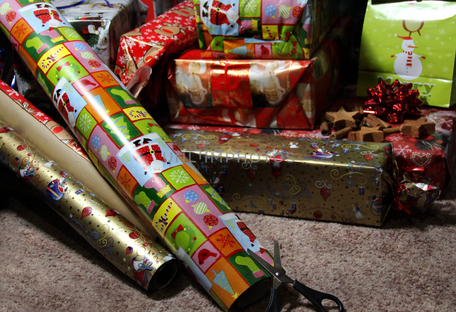 Lot of Christmas gifts wrapped in the beautiful vivid paper 