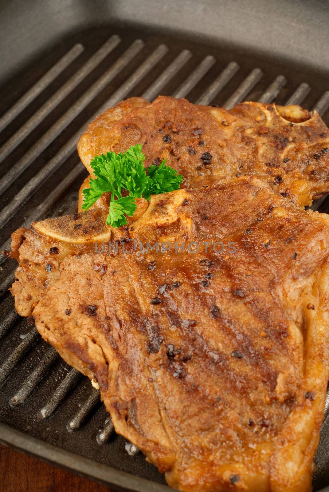 Steak or Chops on a Braai by alistaircotton