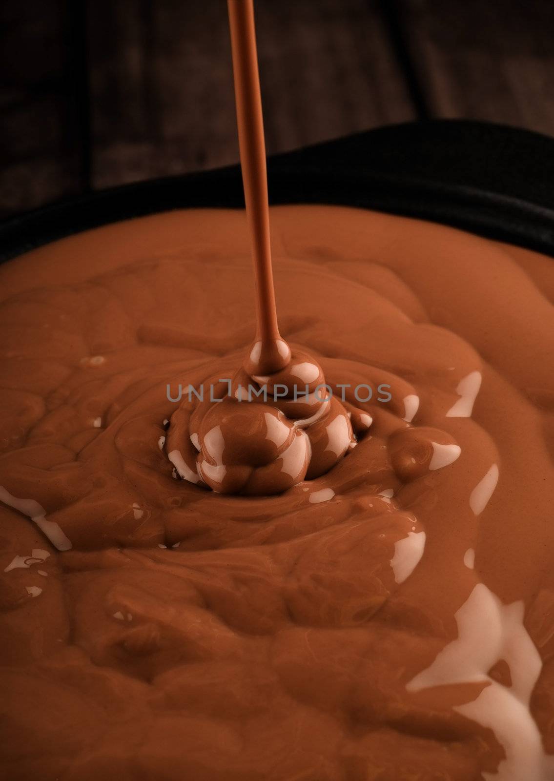 Pouring chocolate by alistaircotton