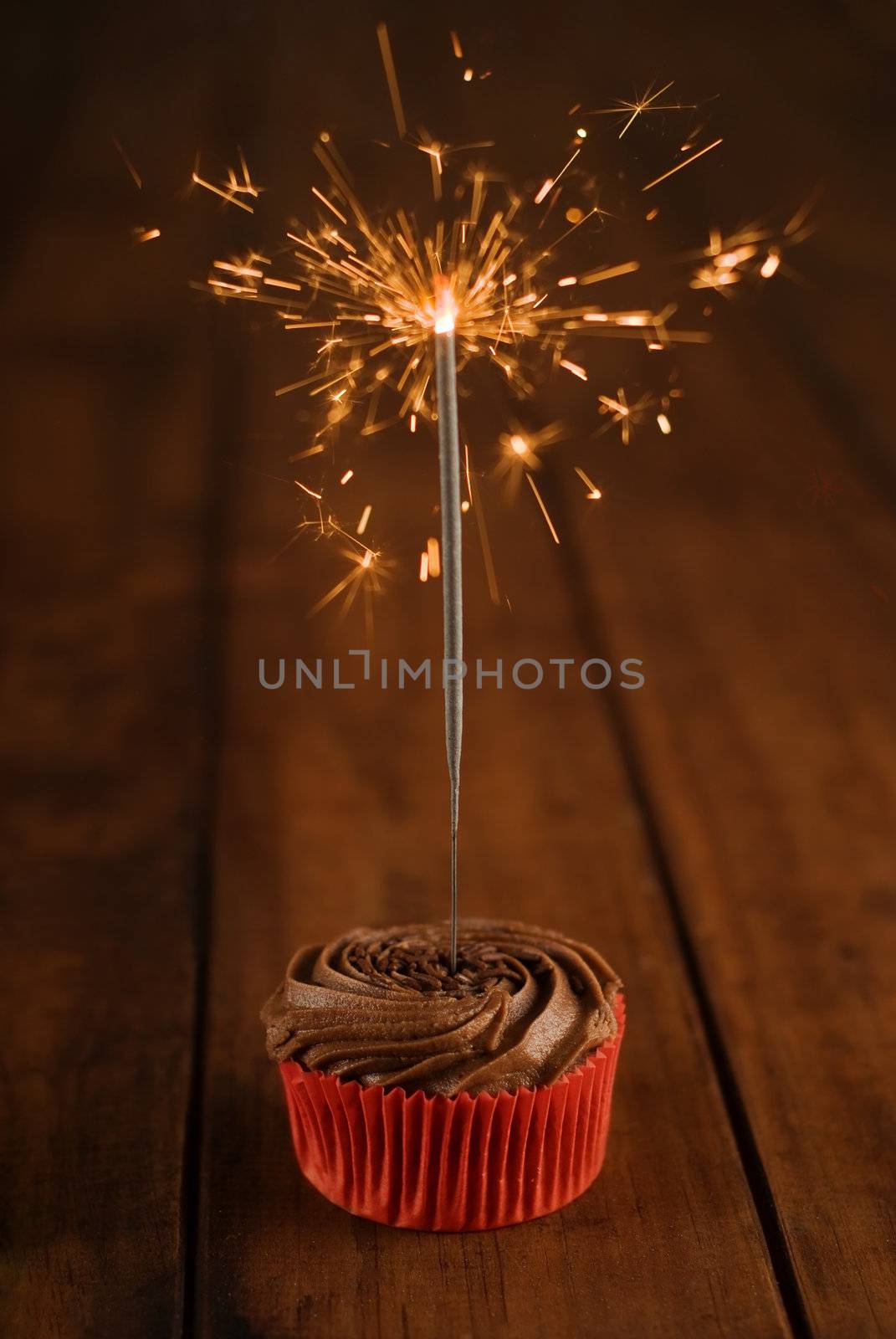 Happy birthday cake cookie with burning spakler