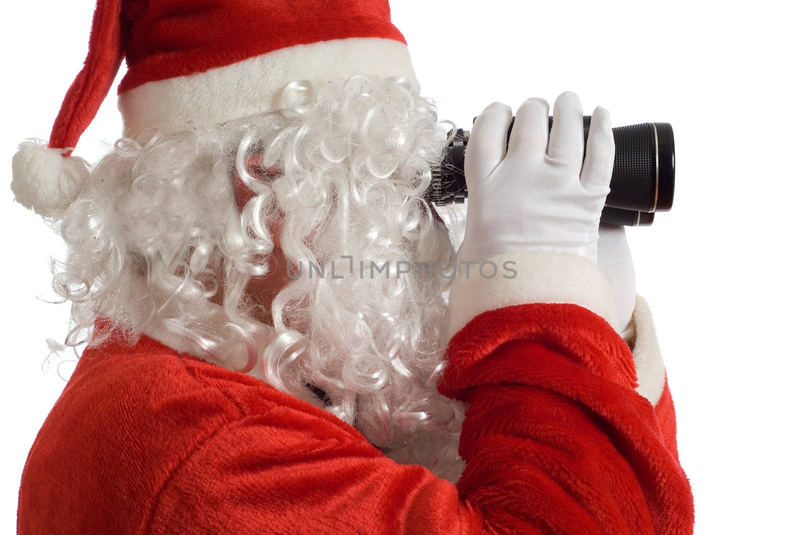 Father Christmas looking at the future business strategy with binoculars to the right