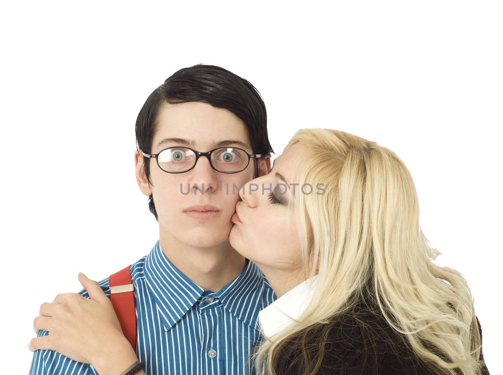 Nerd business man surprised by kiss from pretty valentine girl isolated on white