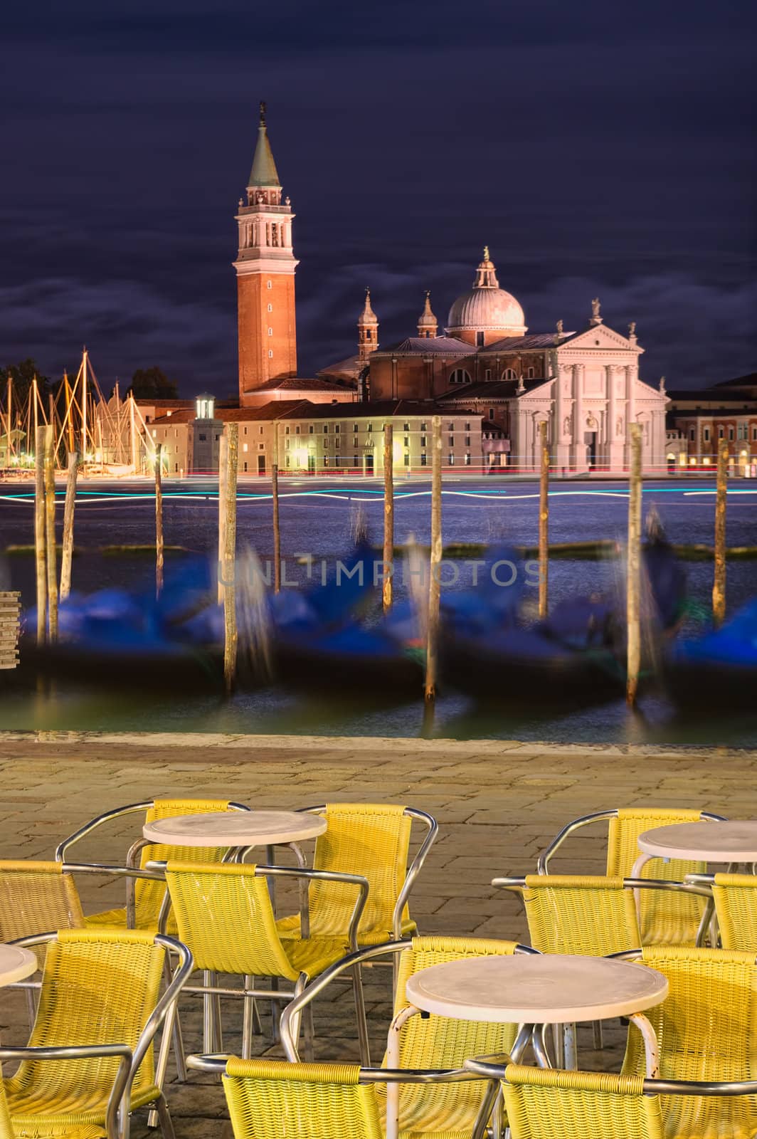 night scene of Venice gondolas cityscape