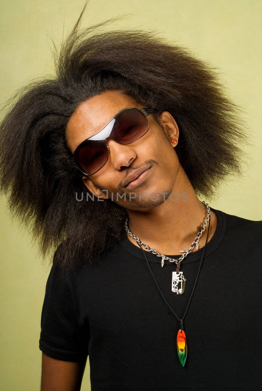 Close-Up of Happy Young African American Man Wearing Sunglasses