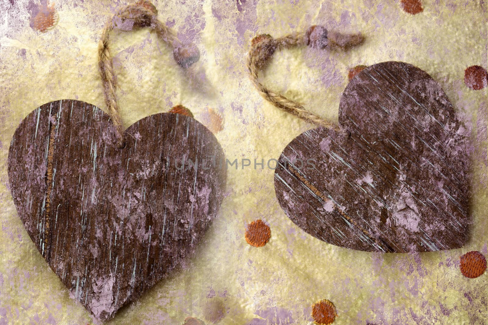grunge, two wooden hearts on cloth
