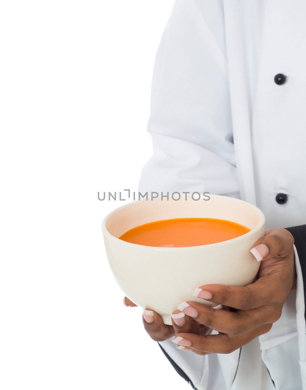 Chef hands and jacket holding or serving soup food isolated on white