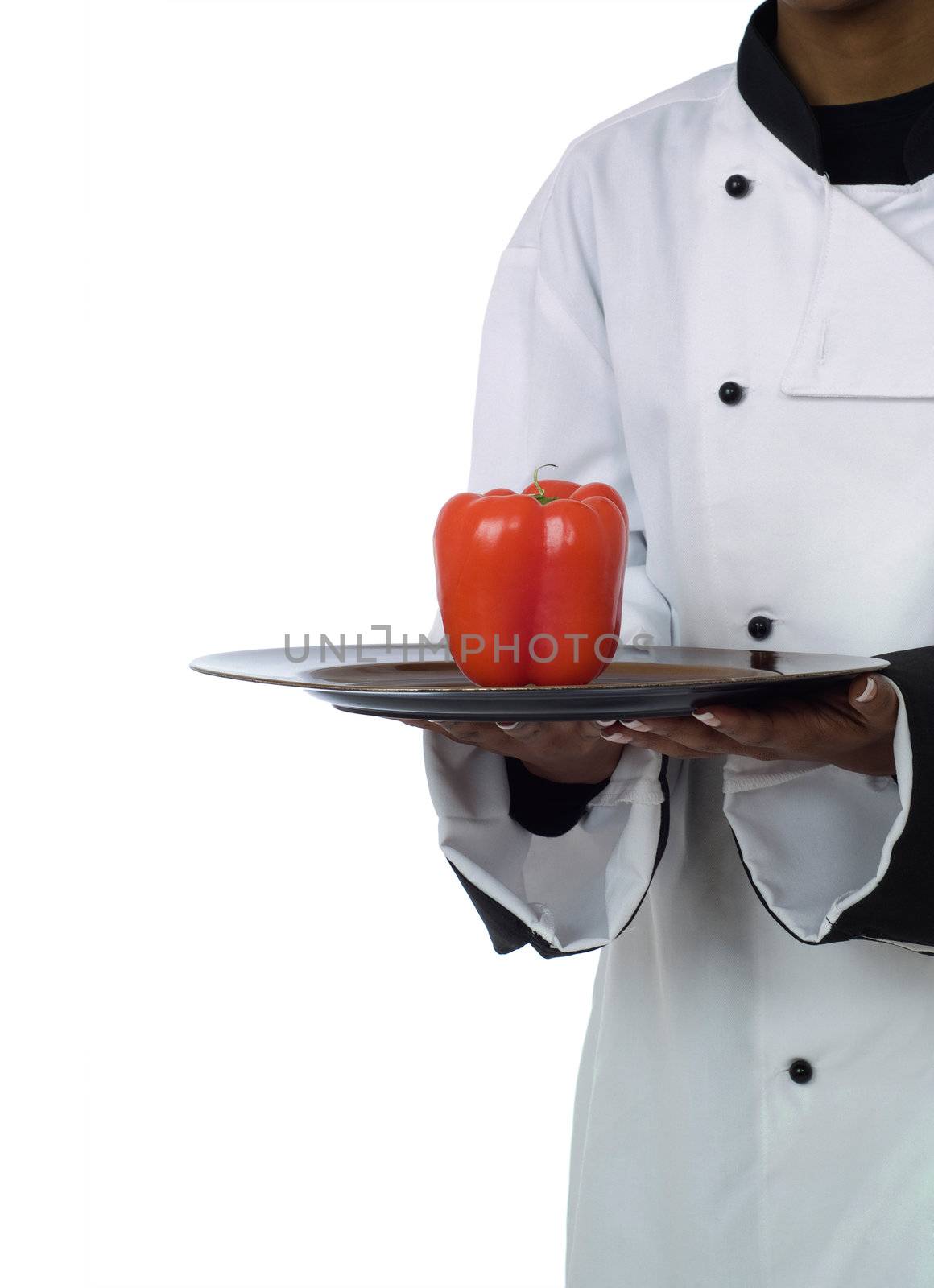 Studio isolated woman female chef with red pepper on white