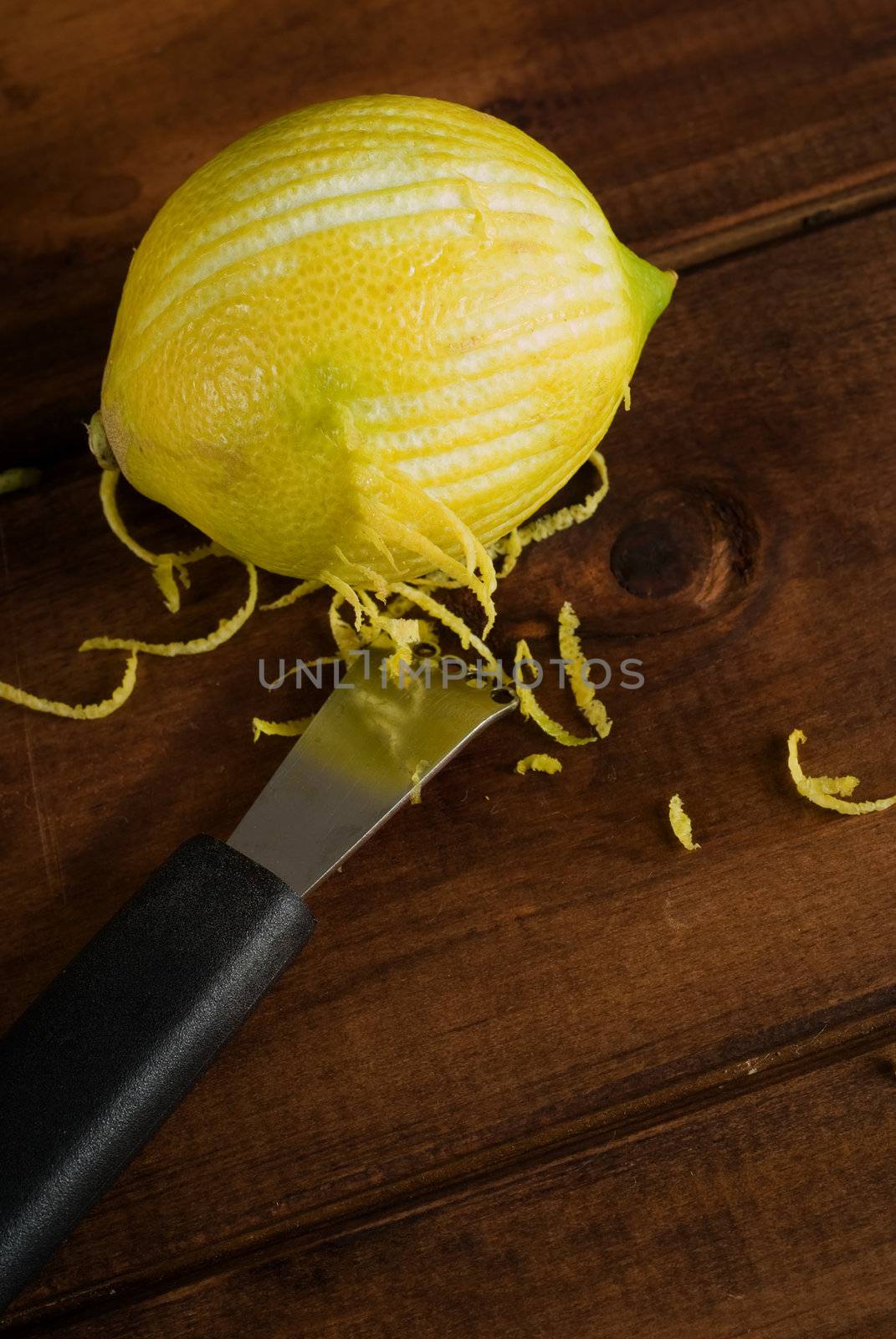 Zesting lemon by alistaircotton