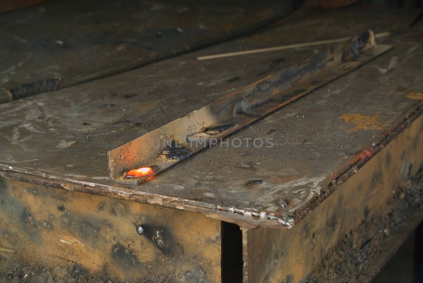 Red hot industrial welding metalwork