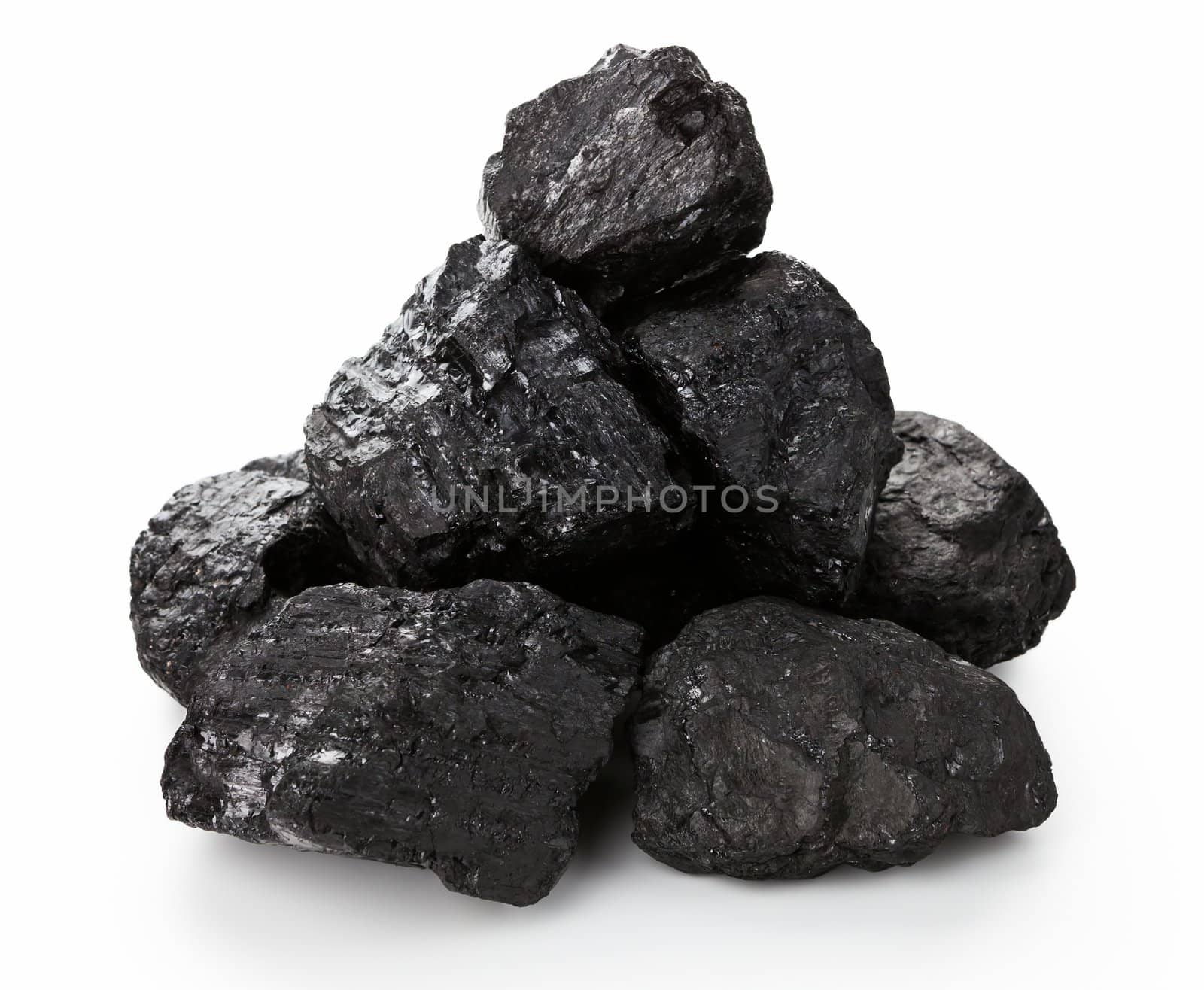 Stack of coal lumps isolated on white background    