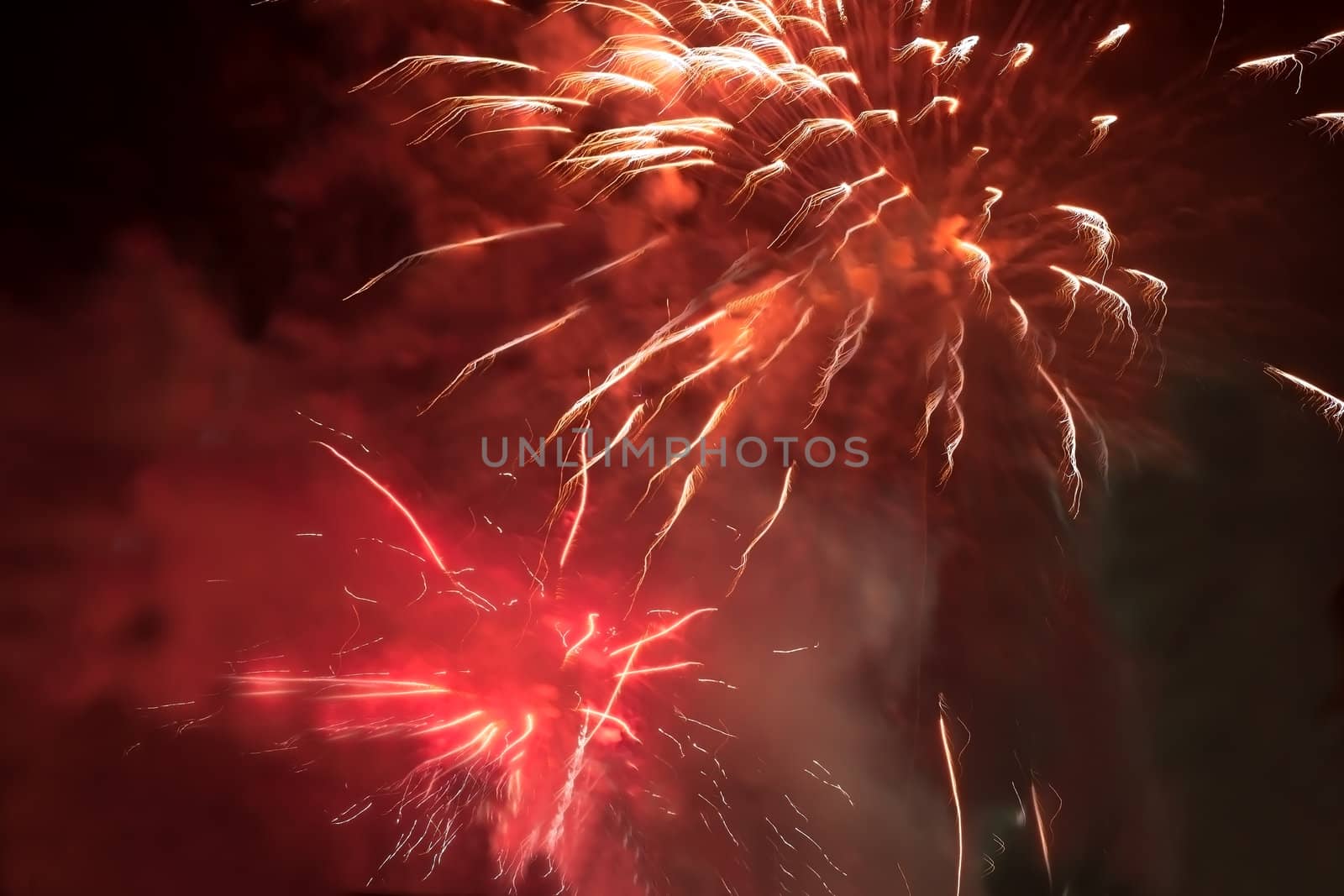 General view of the festive fireworks red in the night sky in Krivoy Rog