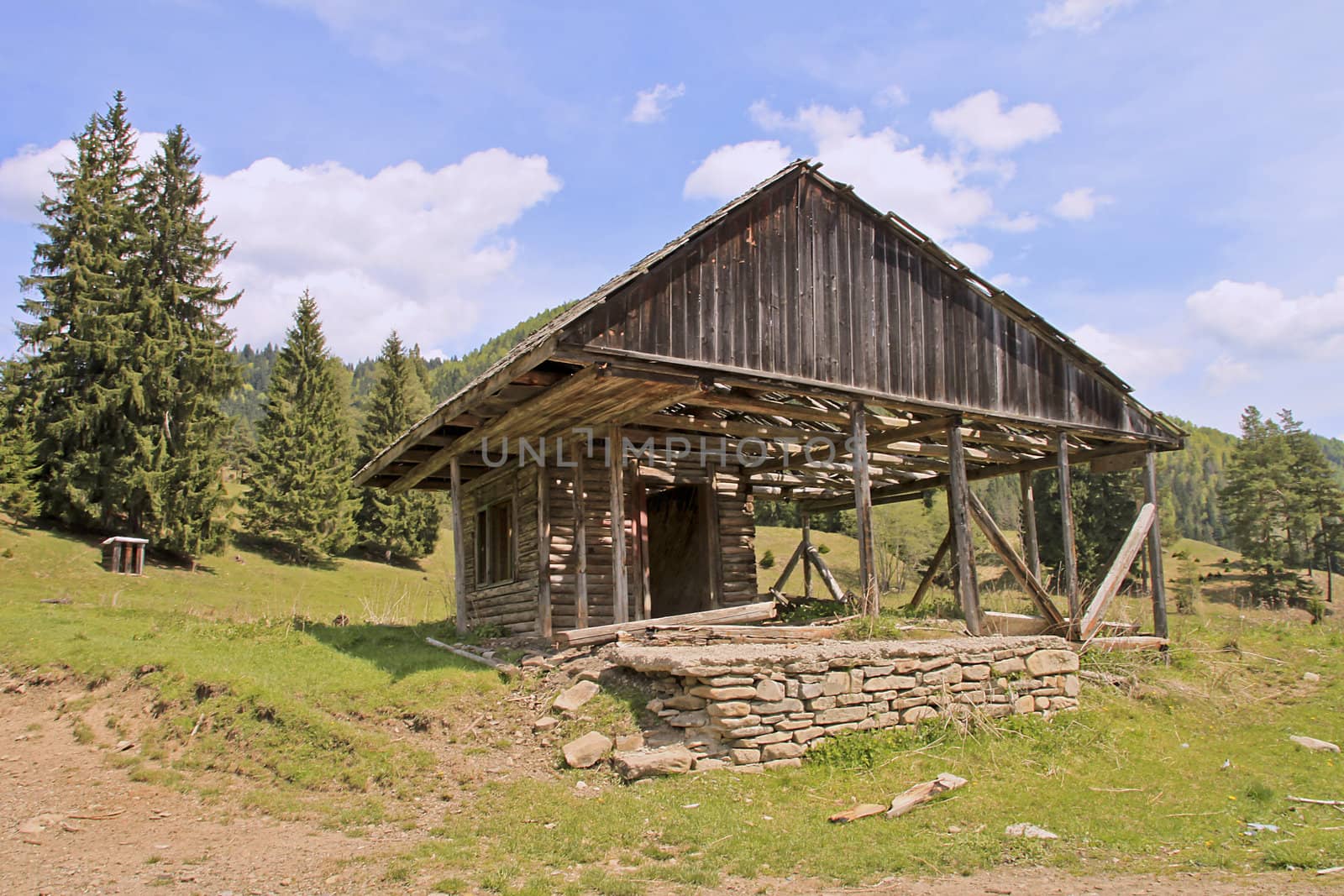 Portrait of an unfinished house on a meadow