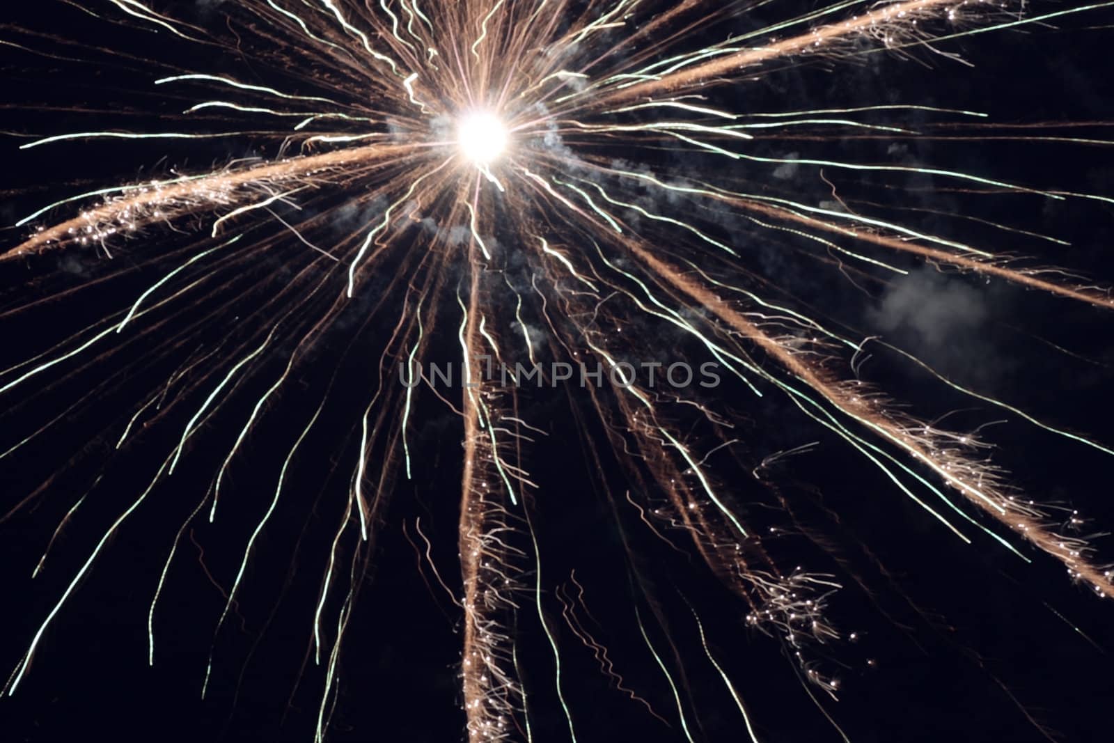 holiday fireworks in night sky