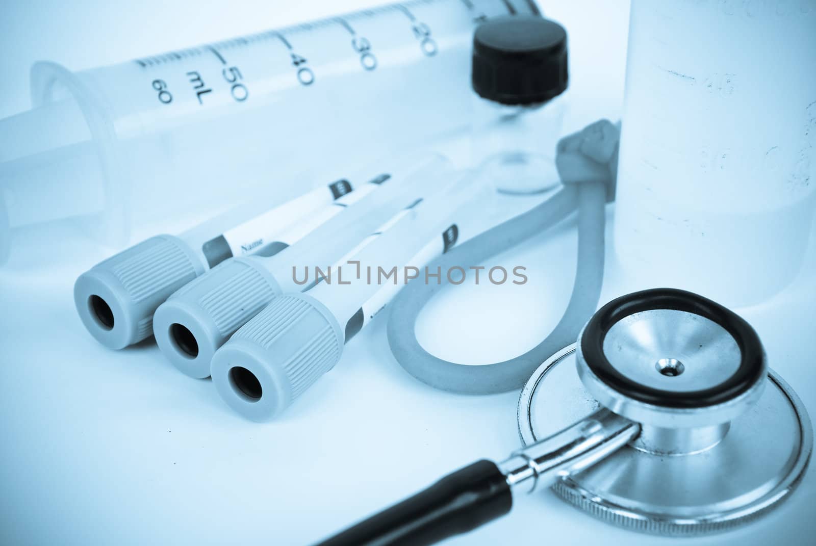 A stethoscope in front of medical