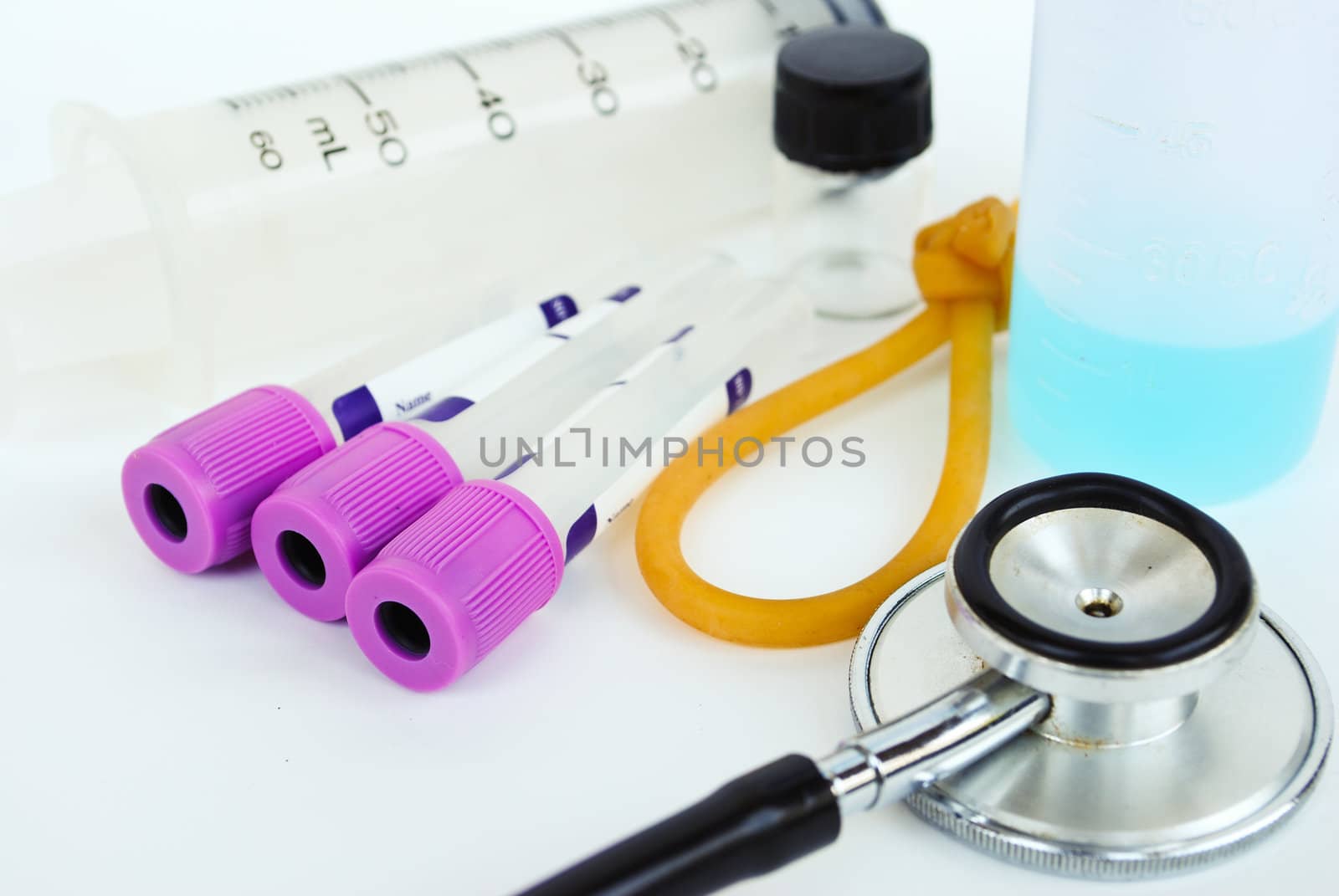 A stethoscope in front of medical