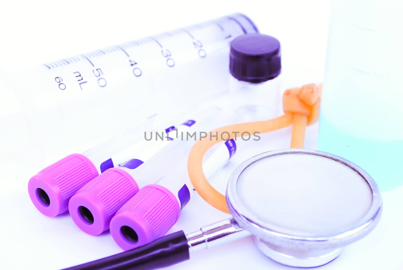 A stethoscope in front of medical
