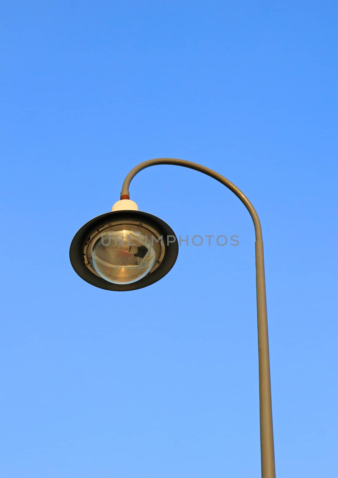 street light against a blue sky 