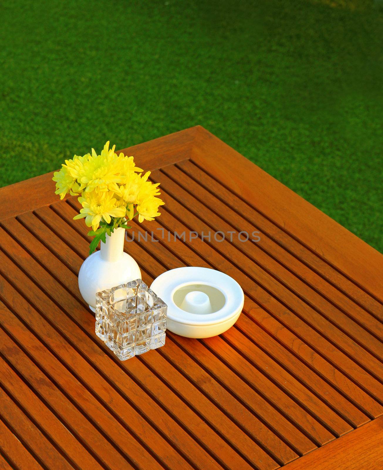 Table setting with flower in outdoor restaurant by nuchylee