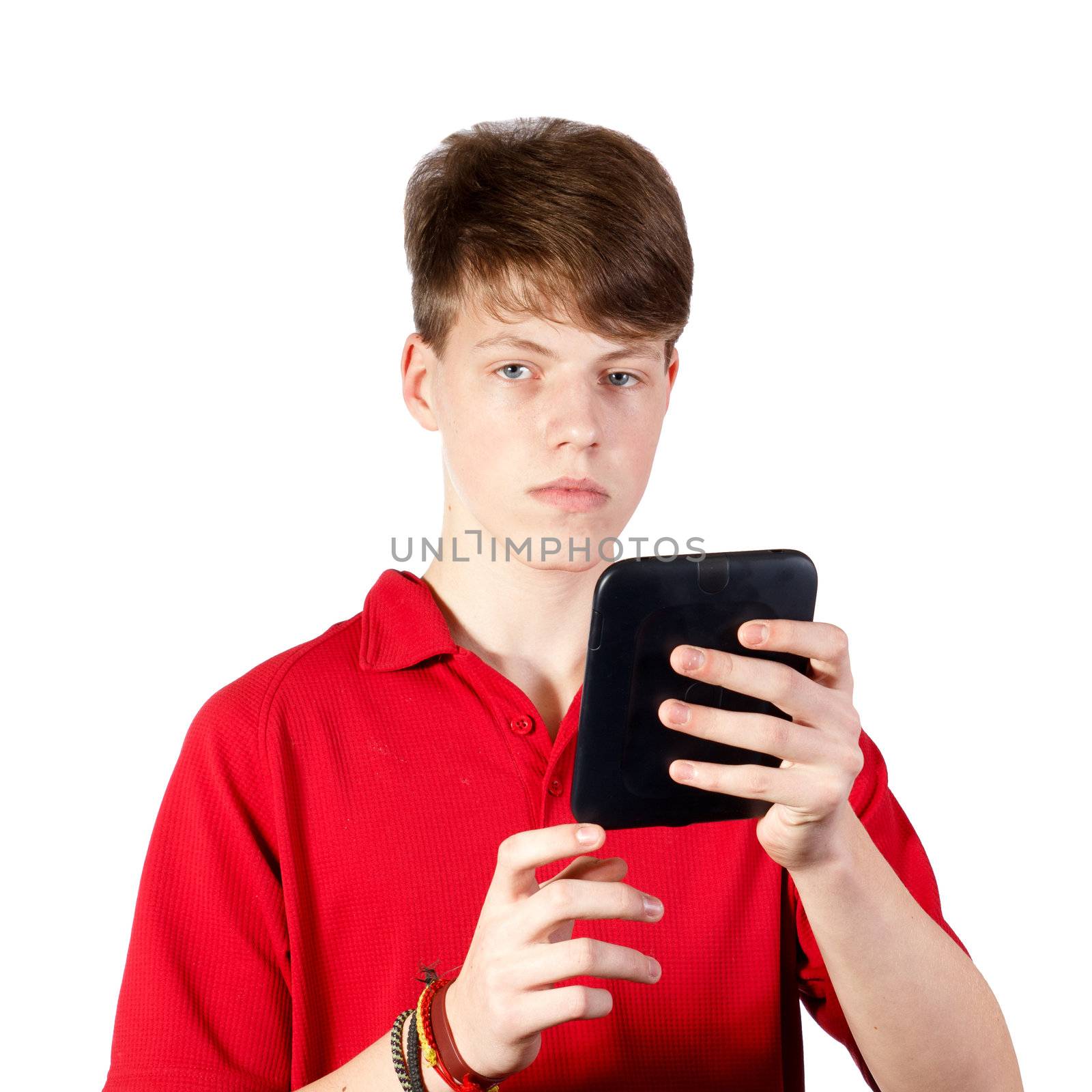 Teenager using ebook reader or tablet pc on a white background