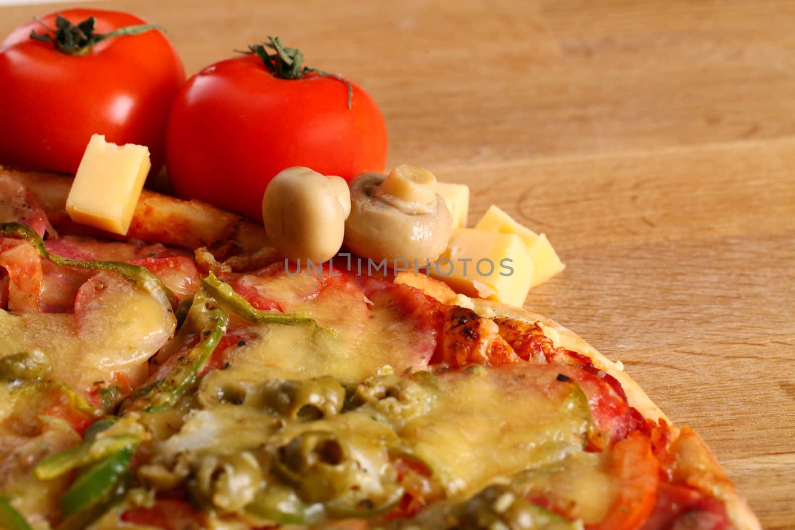 Image of fresh italian pizza on a wooden suface