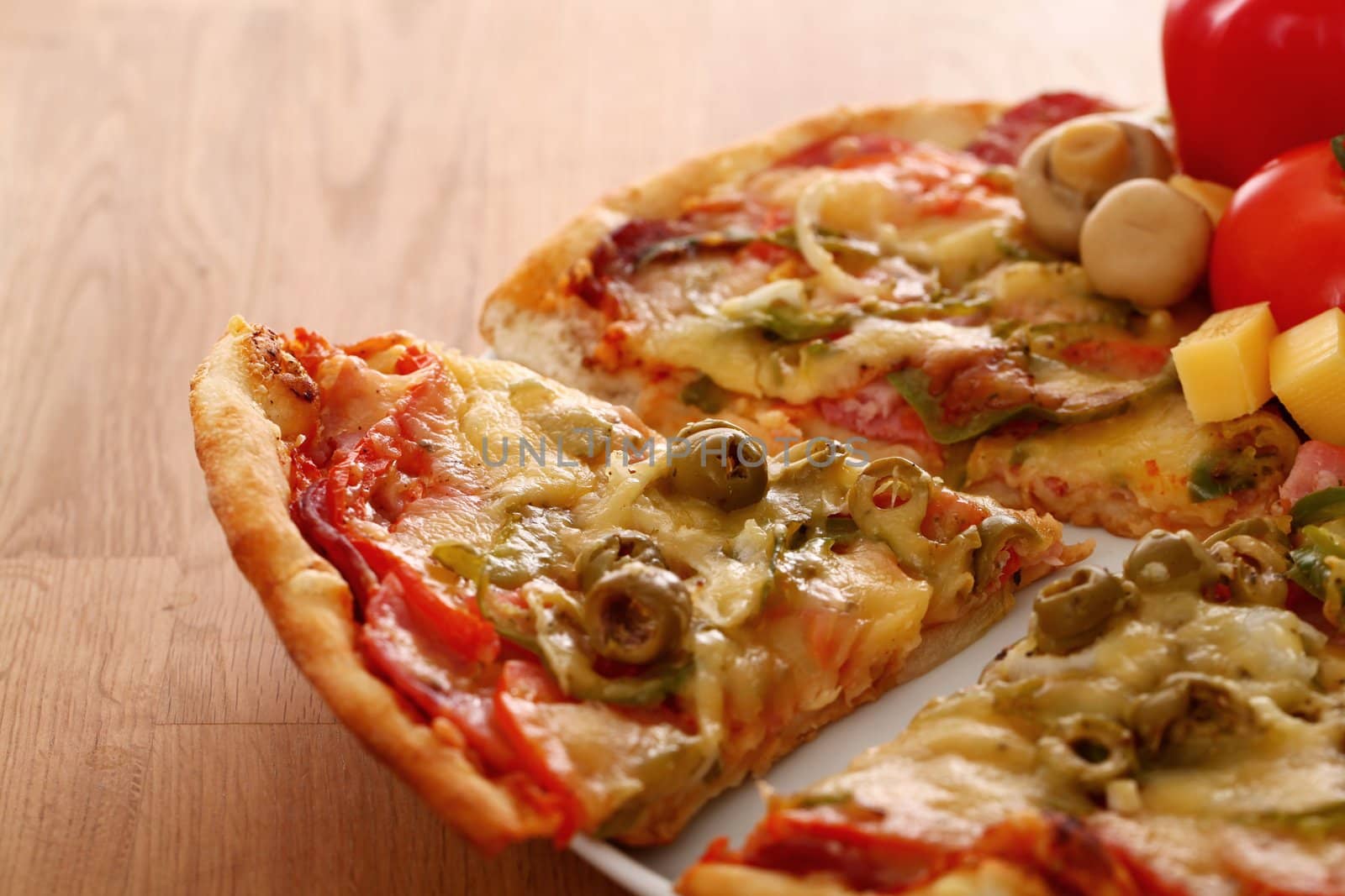 Image of fresh italian pizza on a wooden suface