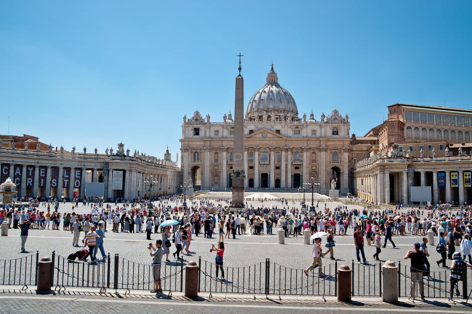 Vaticans Saint Peter Square with lot of Tourists