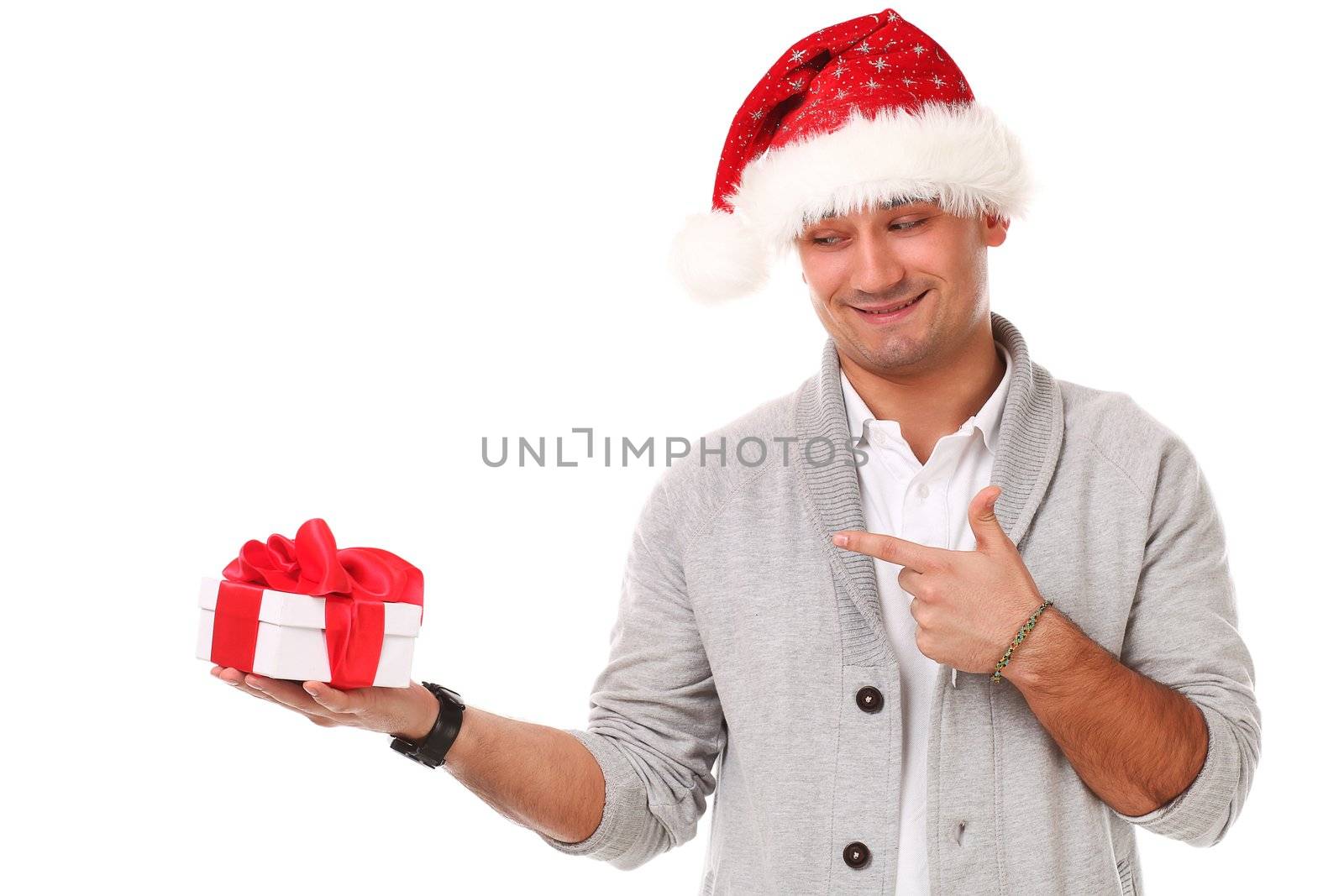 Young caucasian handsome man in christmas hat isolated over white background