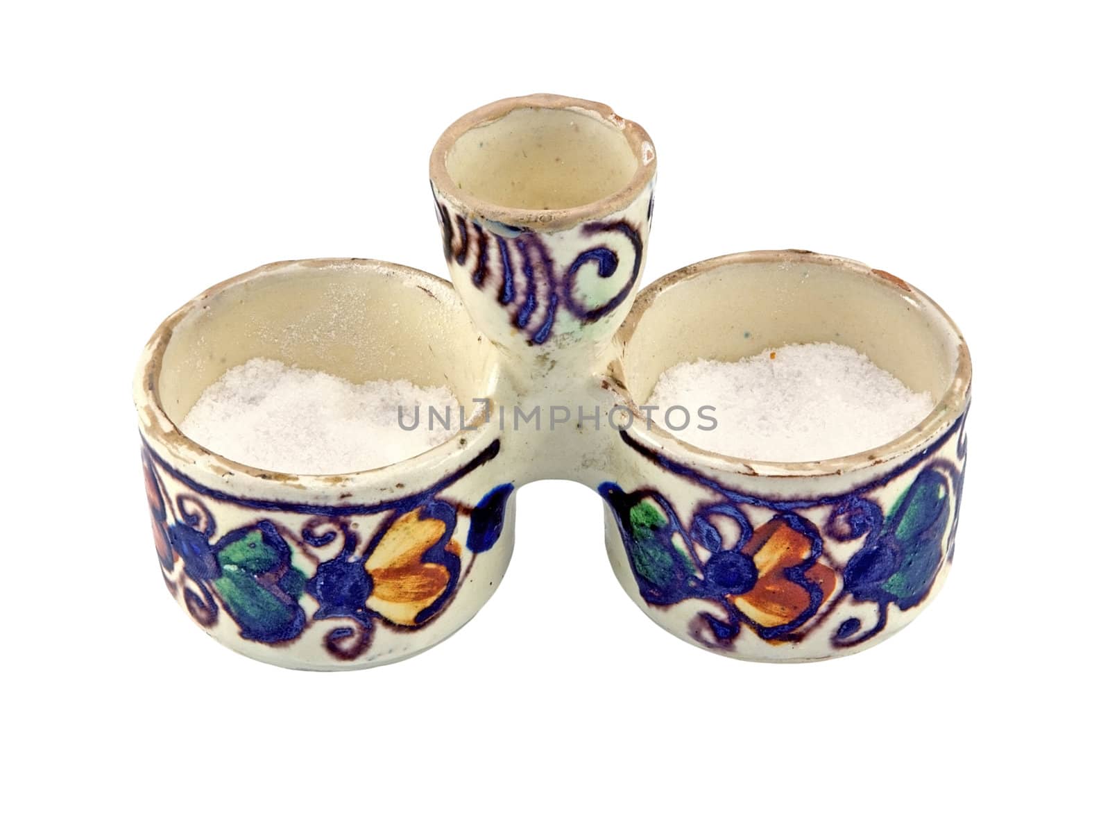 Ceramics salt cellar with traditional Transylvanian patterns isolated on white