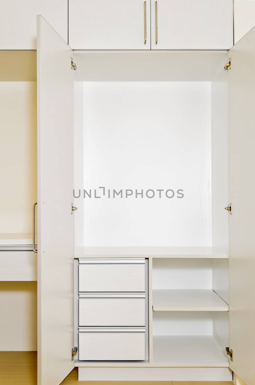 Built-in cabinet in room of an unoccupied newly-built apartment.