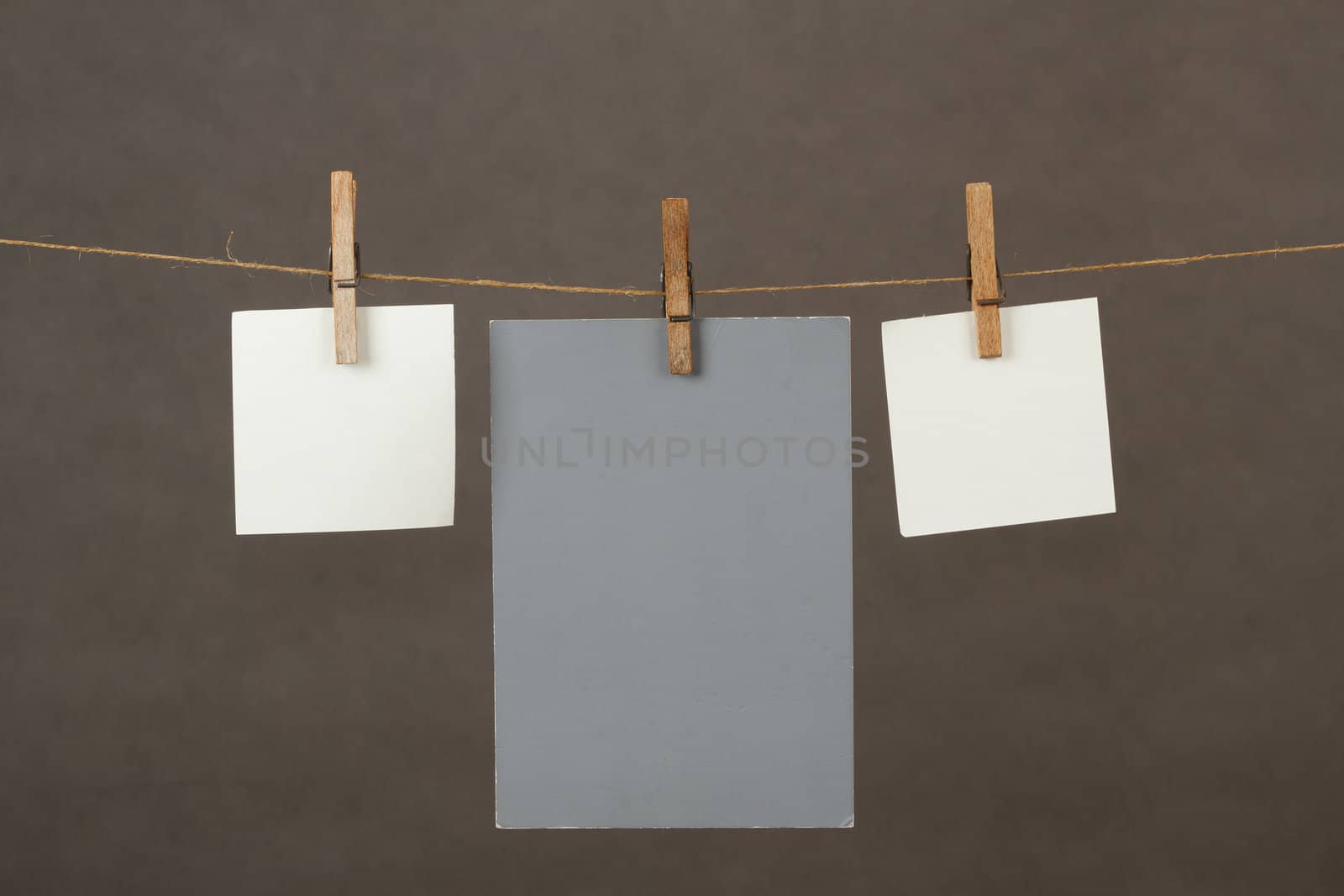 white memory note papers hanging on cord