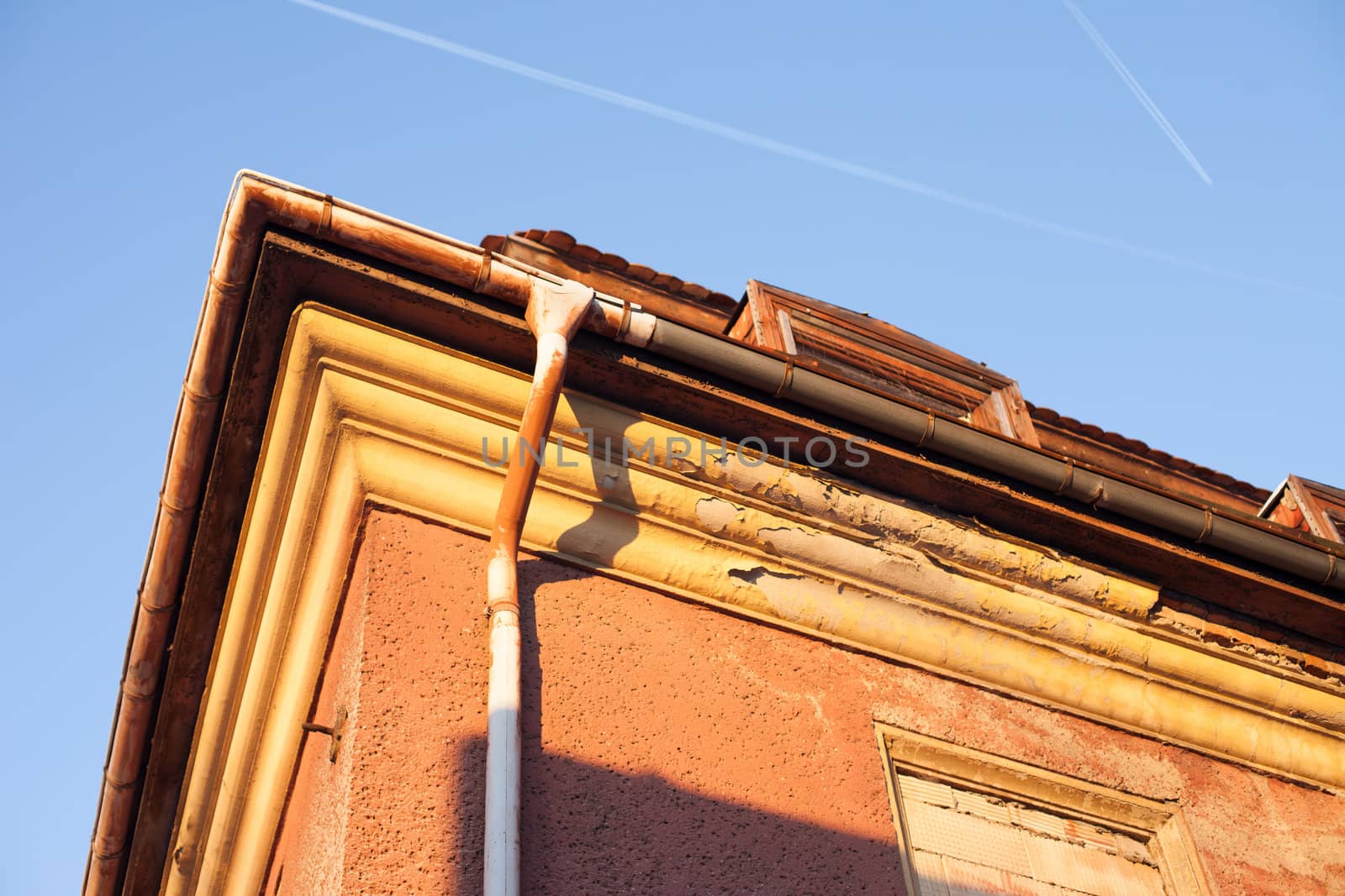 Abandoned house sealed with bricks in winter