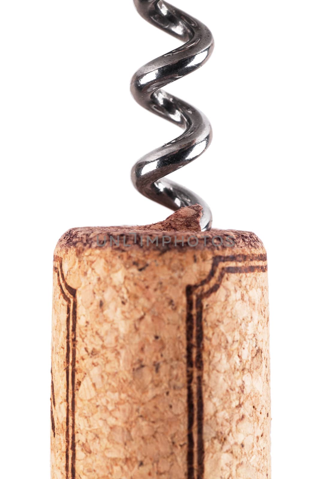 Closeup top view of spiral wine corkscrew over white background