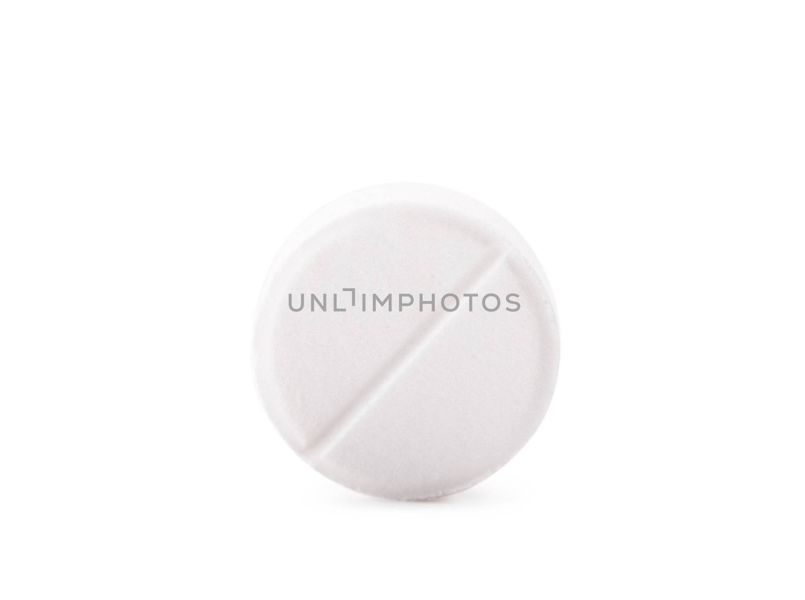 Macro view of white pill on a white background