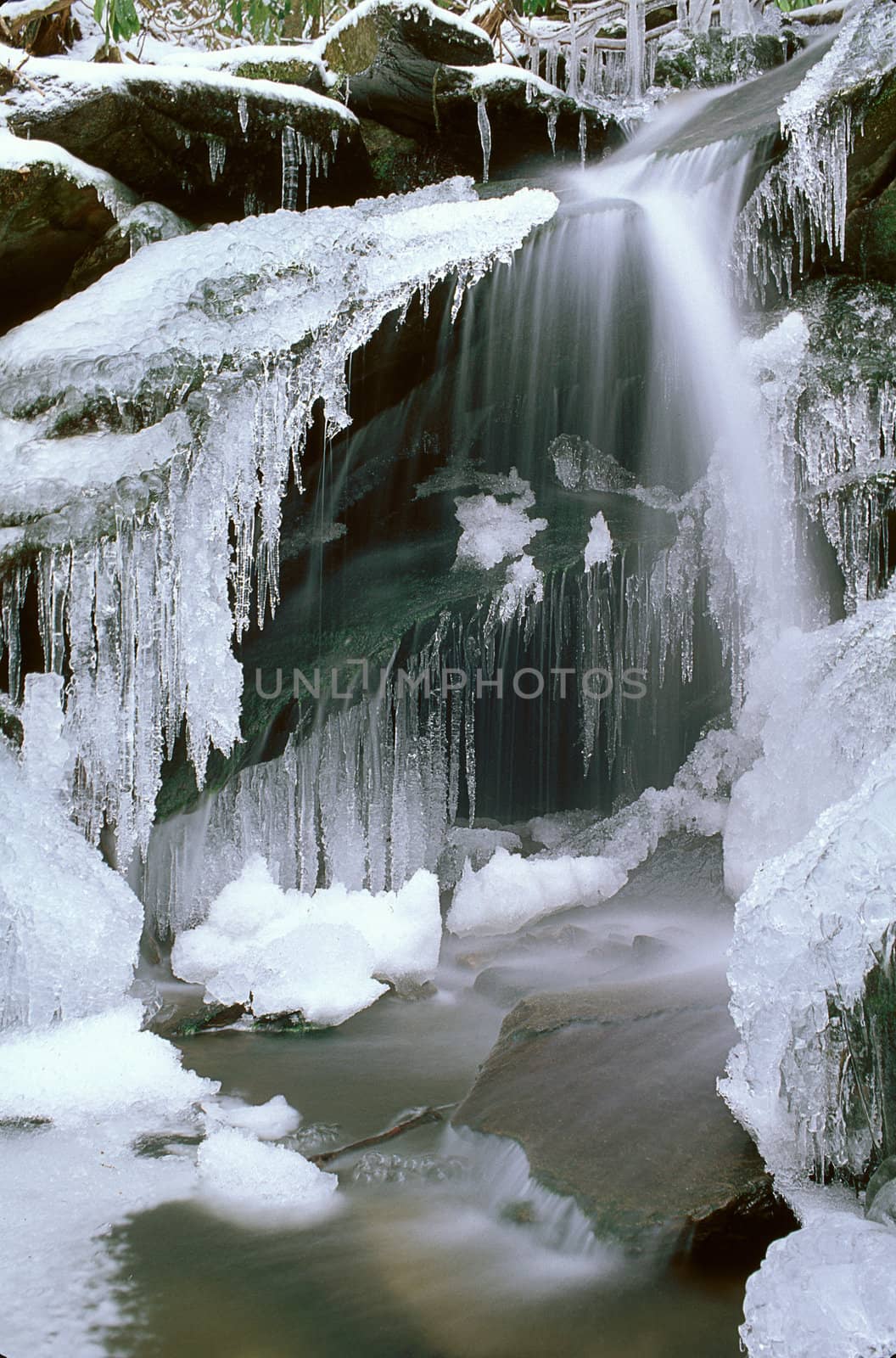 Small frozen waterfall with icycles