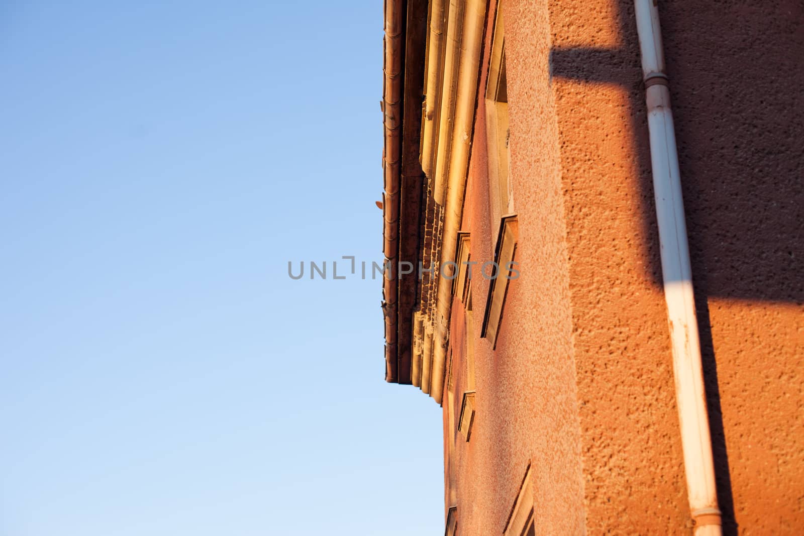 Abandoned house sealed with bricks in winter