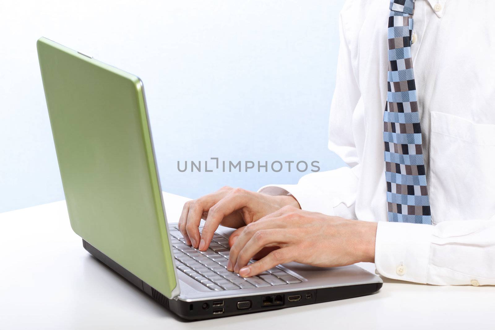 Man working at a Laptop on a Desk