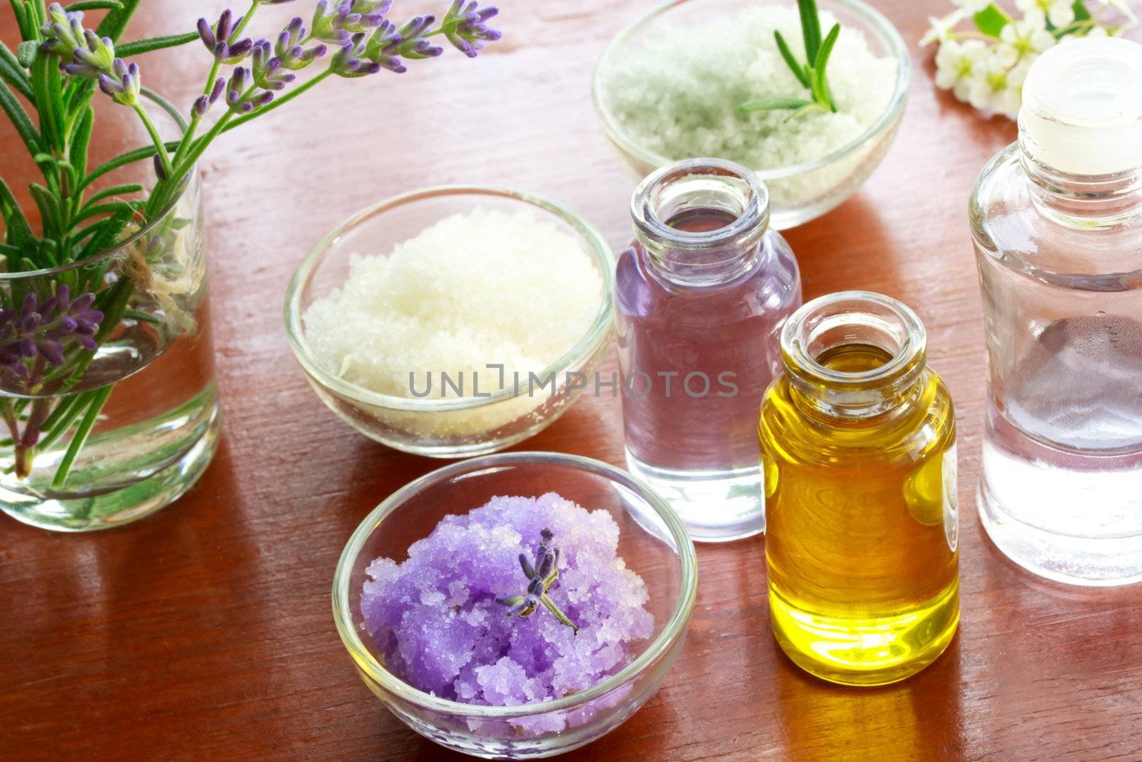 Bath salt with aromatherapy oil on wooden board