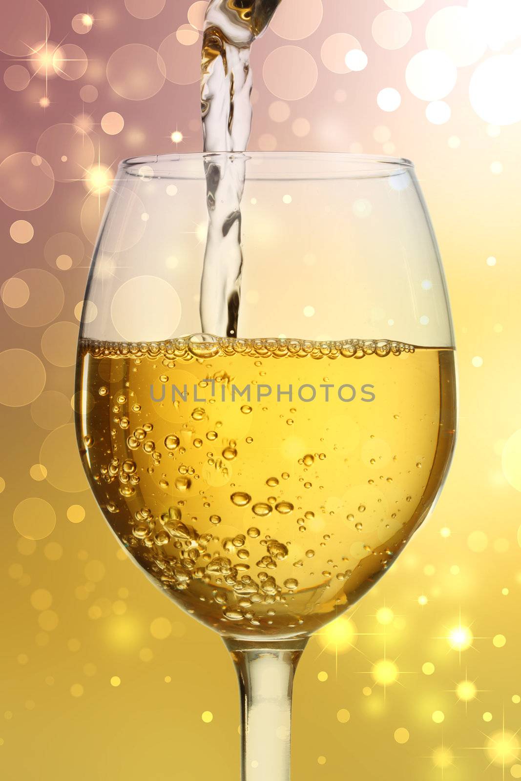 White wine being poured into a wine glass