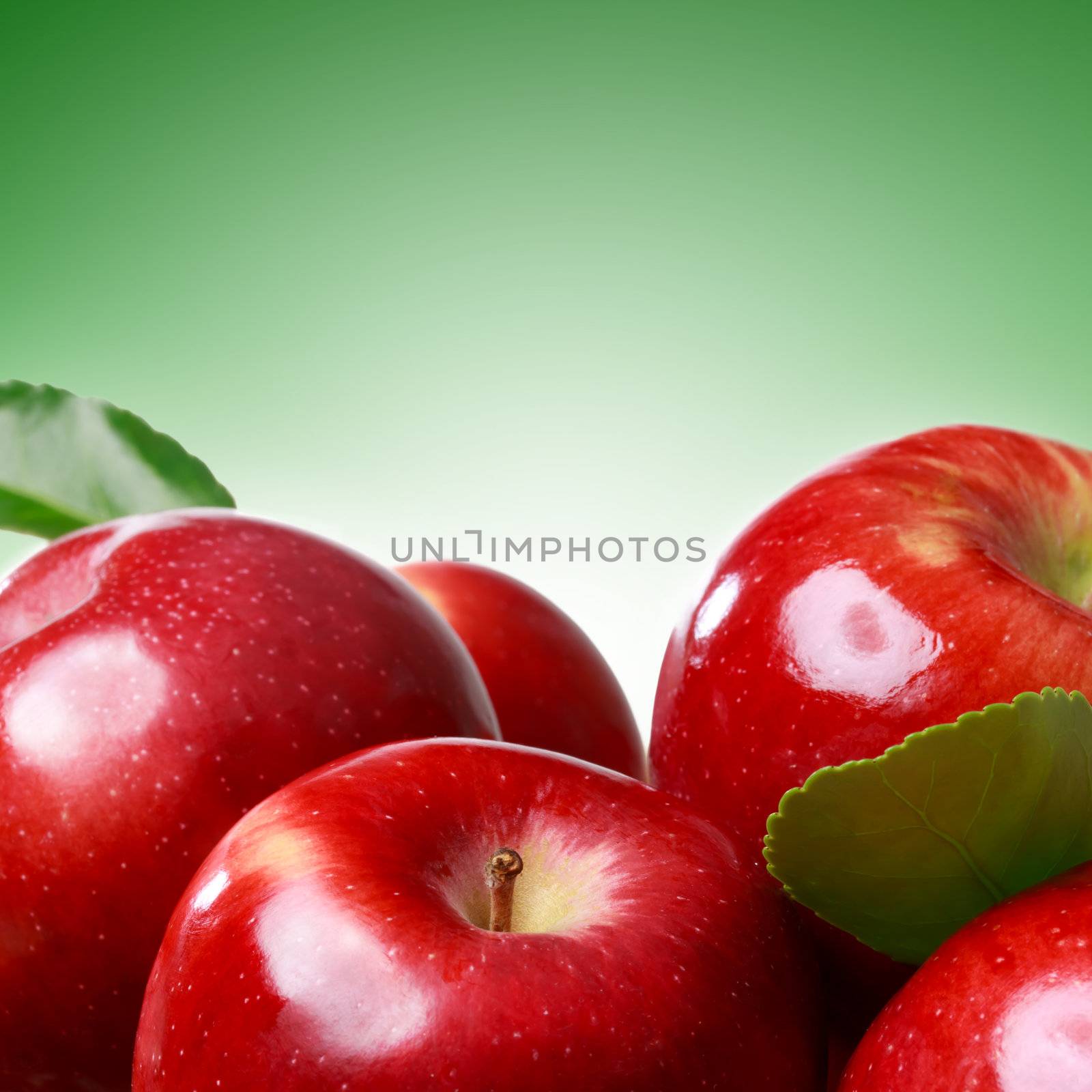 Fresh apples on green soft green background