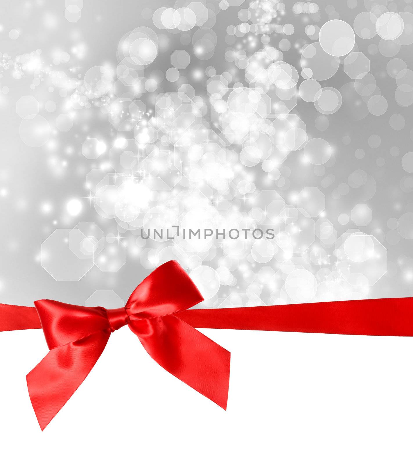 Red Bow and Ribbon with Bokeh Lights Background 