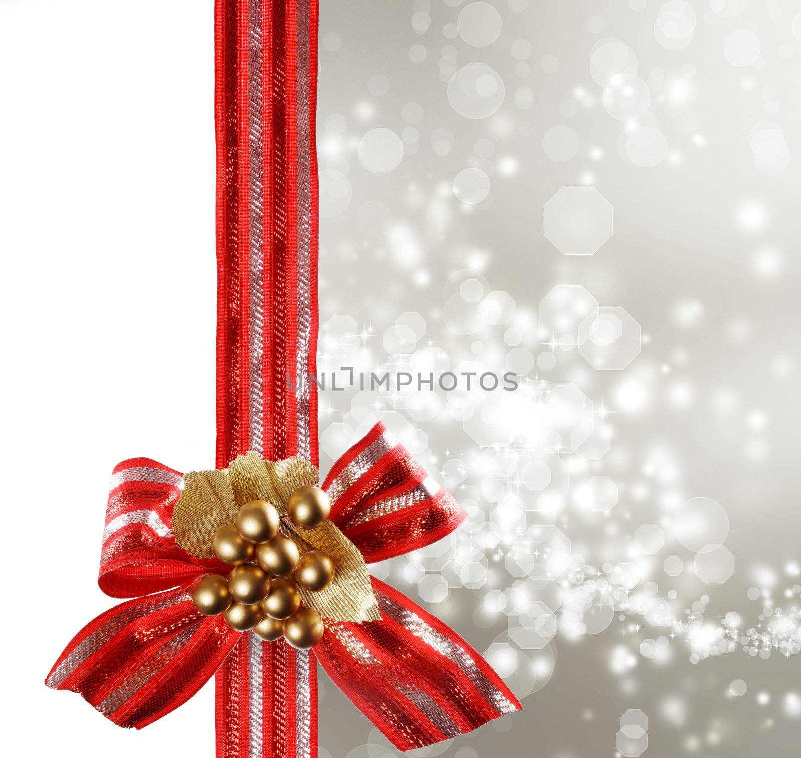 Red Bow and Ribbon with Sliver Bokeh Lights Background 