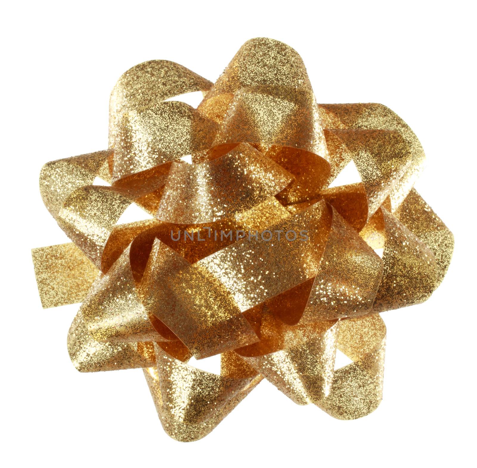 golden sparkling holiday gift bow on white background