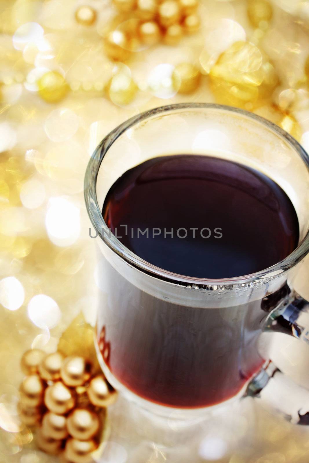 Cup of Coffee with Christmas Ornaments with Abstract Lights